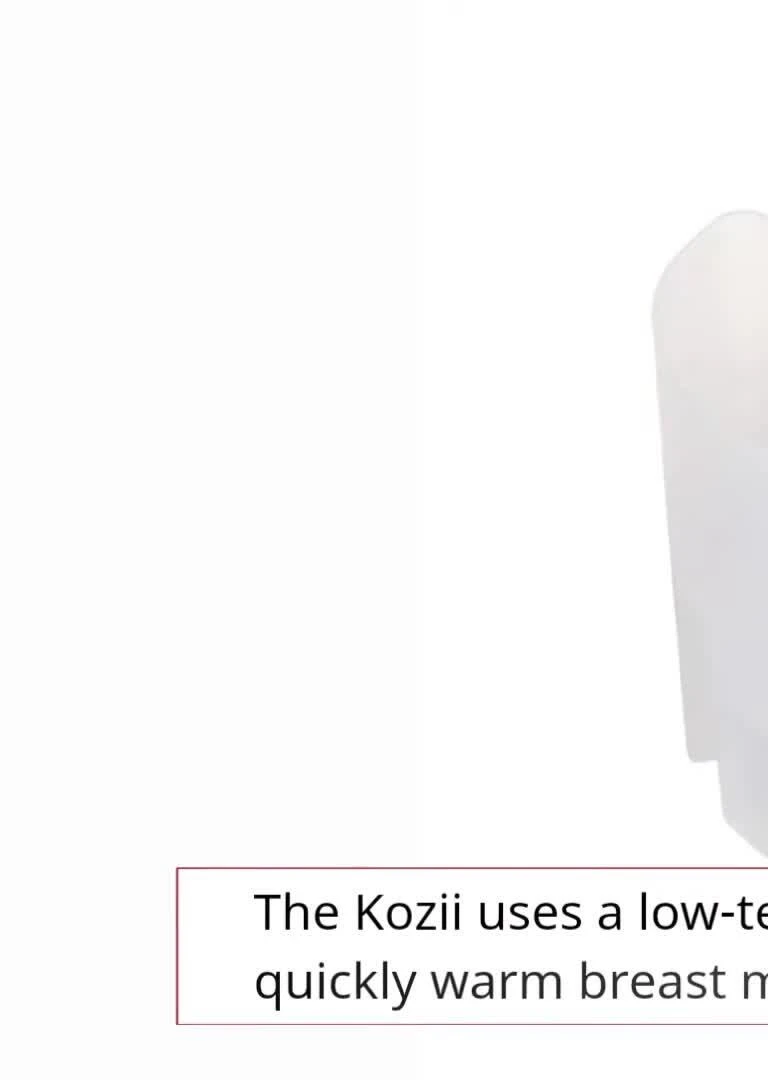 Close-up of the Kiinde Kozii Bottle Warmer during the warming process, showcasing the water bath.