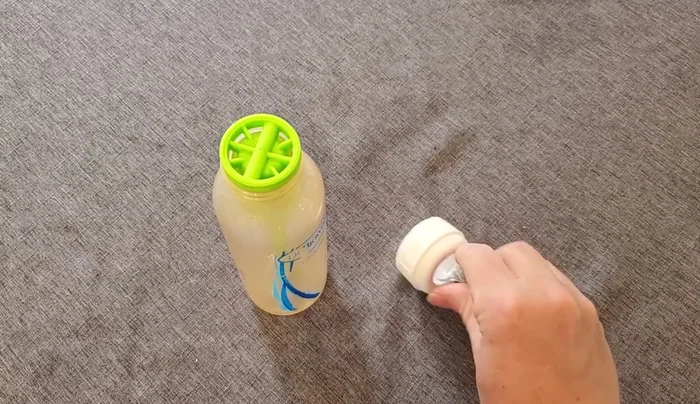 Attach the nipple to the ring, pulling from the other side to secure it.