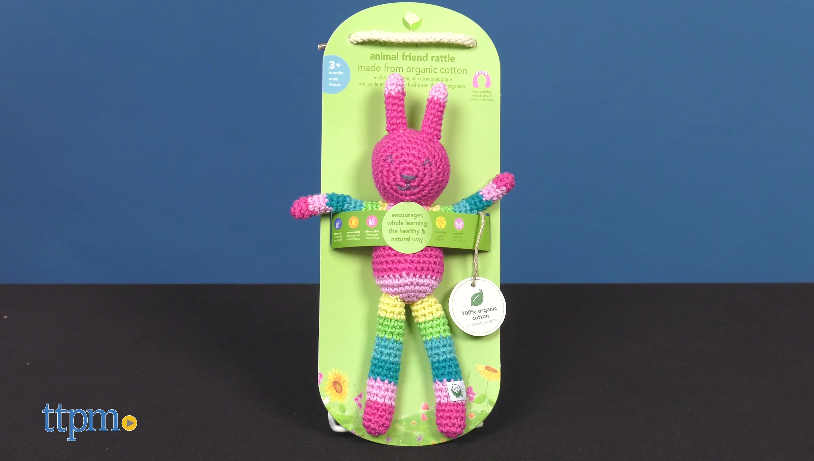 The animal rattle displayed, showcasing the rainbow pattern.