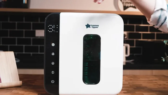 Once the cycle is complete (indicated by the lights turning off), remove items. Note: Items may be slightly warm.