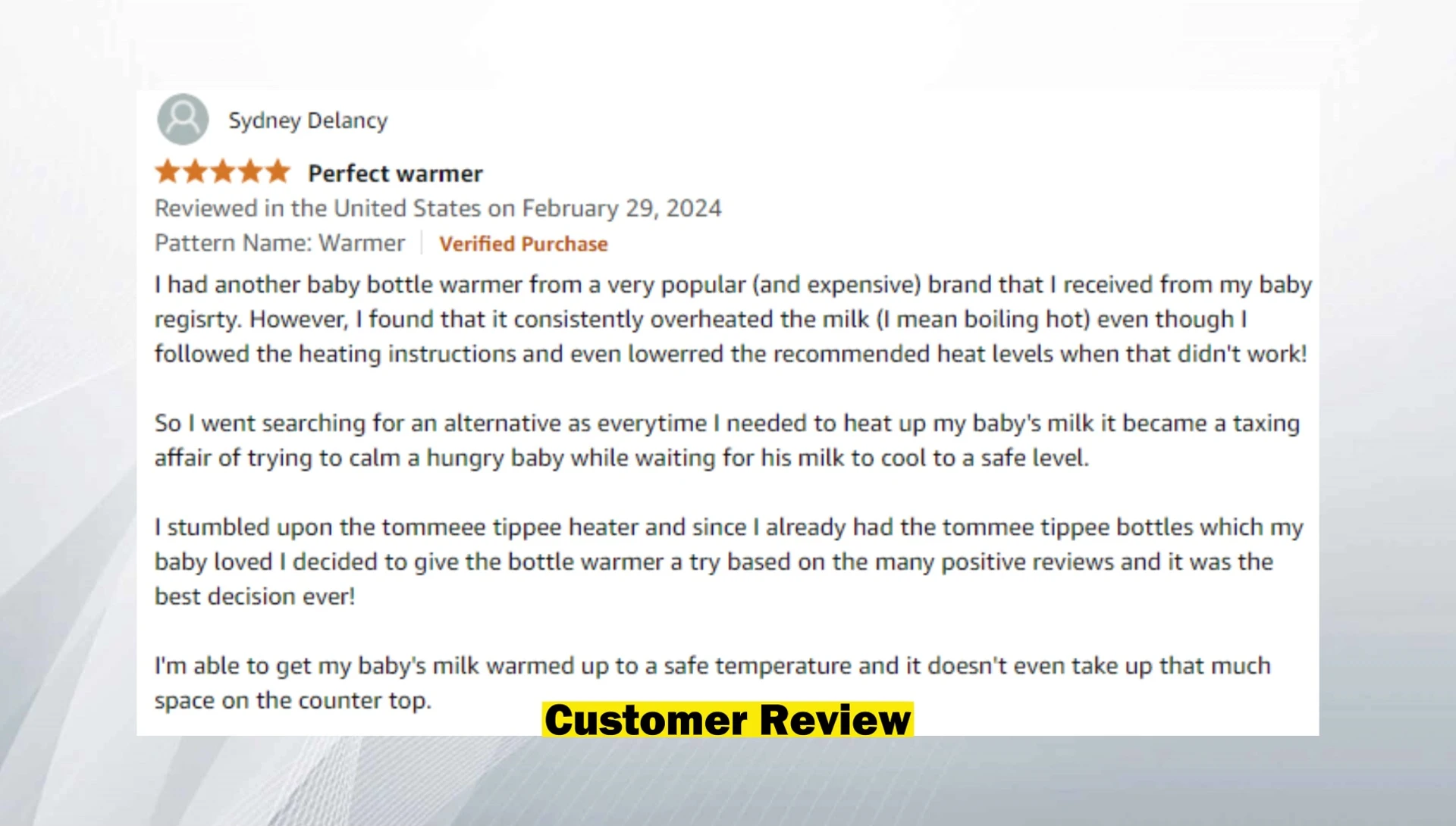 The Tommy Tippy bottle warmer with its cradle insert.