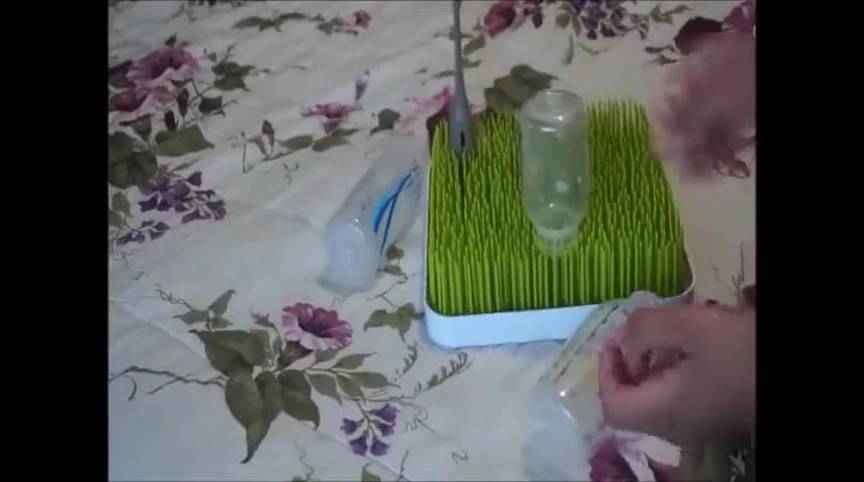 Demonstrating bottles falling off during movement