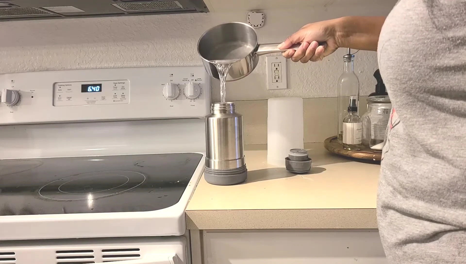 Pouring boiling water into the thermos