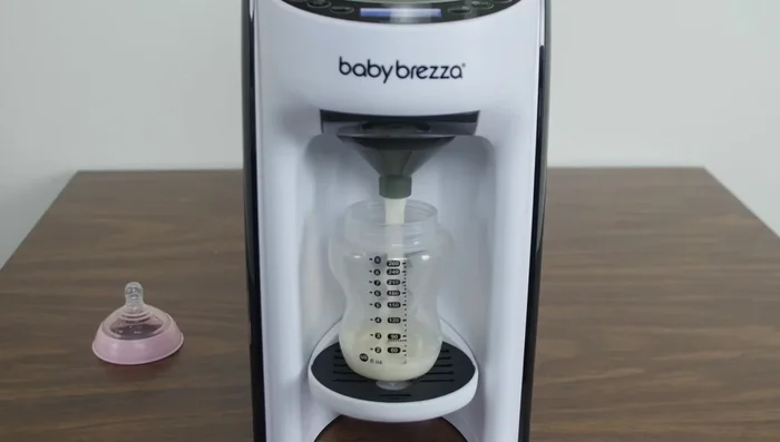 Press the start button to dispense the formula.