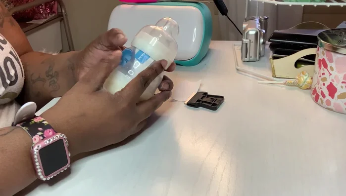 Smooth out any air bubbles as you apply, using a scraper to ensure adhesion and prevent wrinkles. Pay close attention to areas with textured surfaces or grooves.