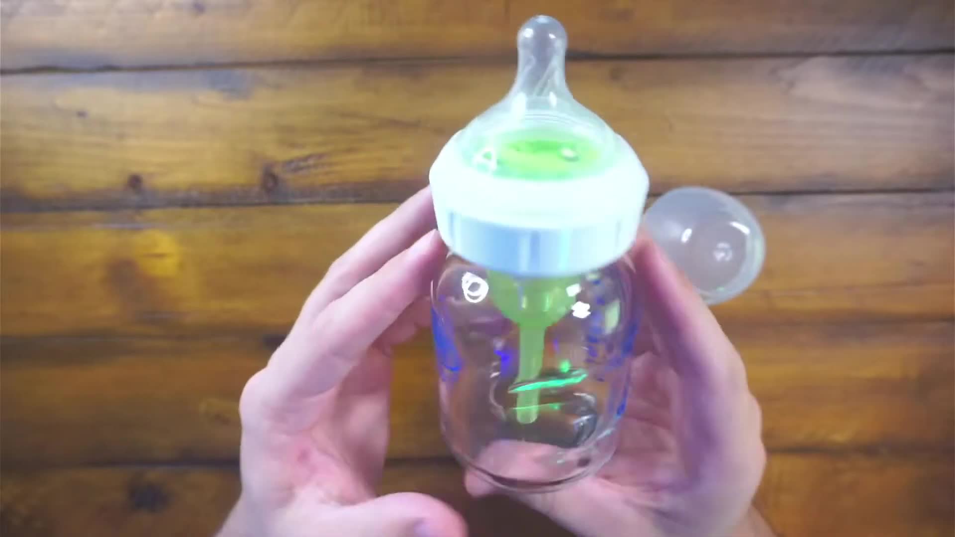 Close-up of the Dr. Brown's glass bottle, showcasing its design and indentations.