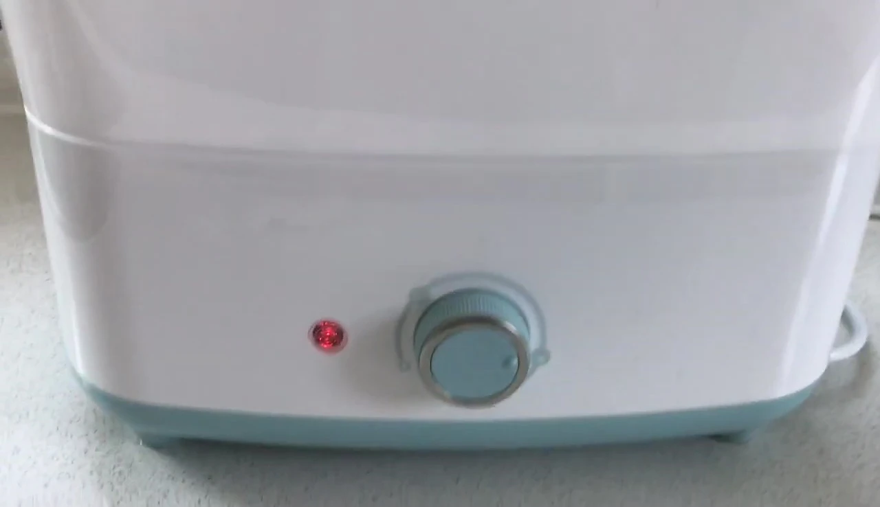 Control panel highlighting the sterilization and drying options.