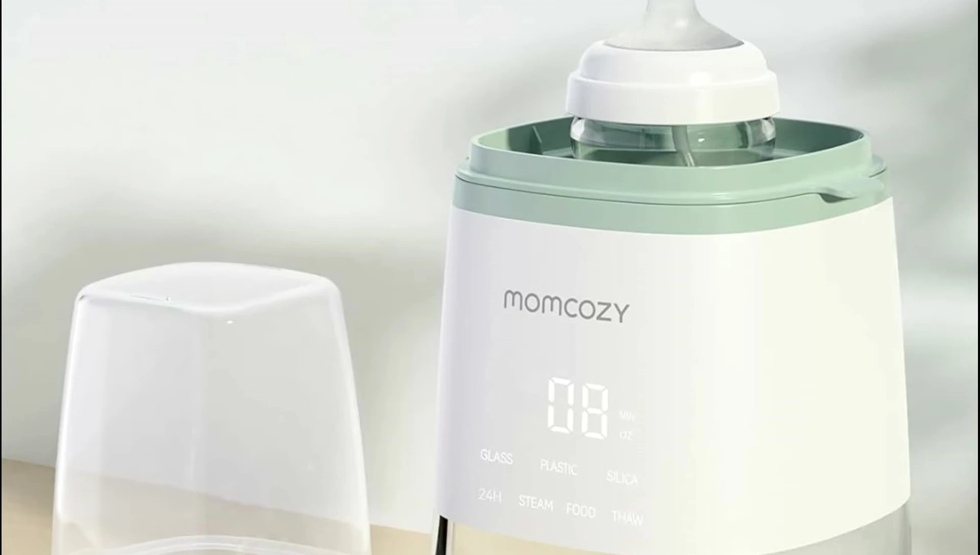 The Momcozy warmer's steam function highlighted