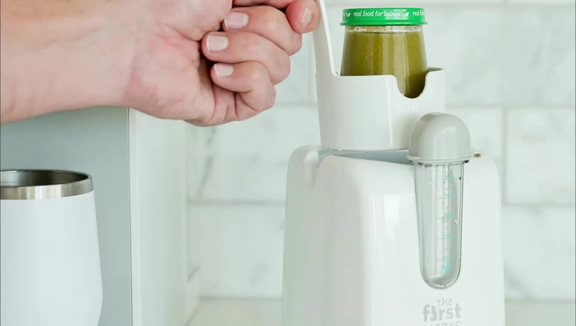 Showing the dishwasher-safe components of the First Years warmer