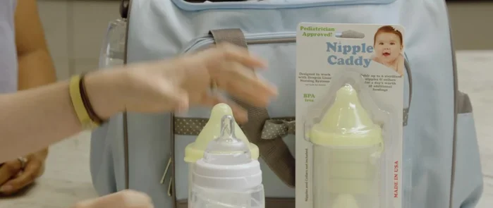 Place the used, dirty nipple and collar into the bottom compartment.