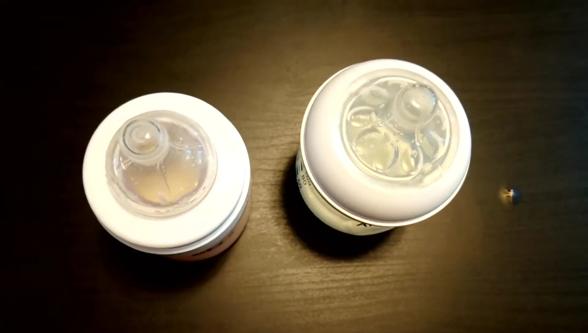 Baby feeding from a bottle.
