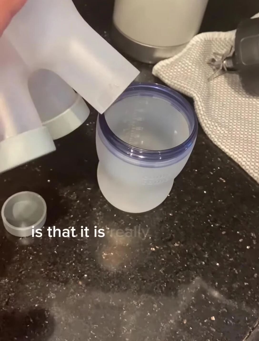 Shot emphasizing the narrow base of the container.