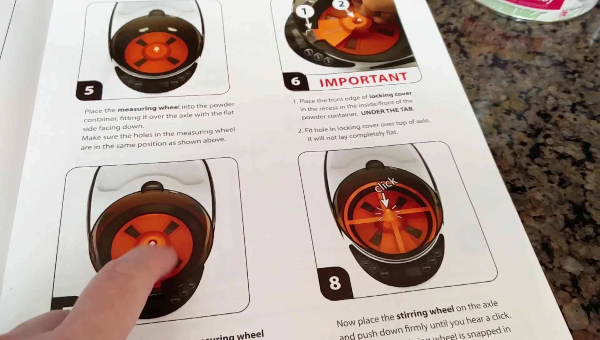 Close-up showing the internal mechanism of the formula dispenser
