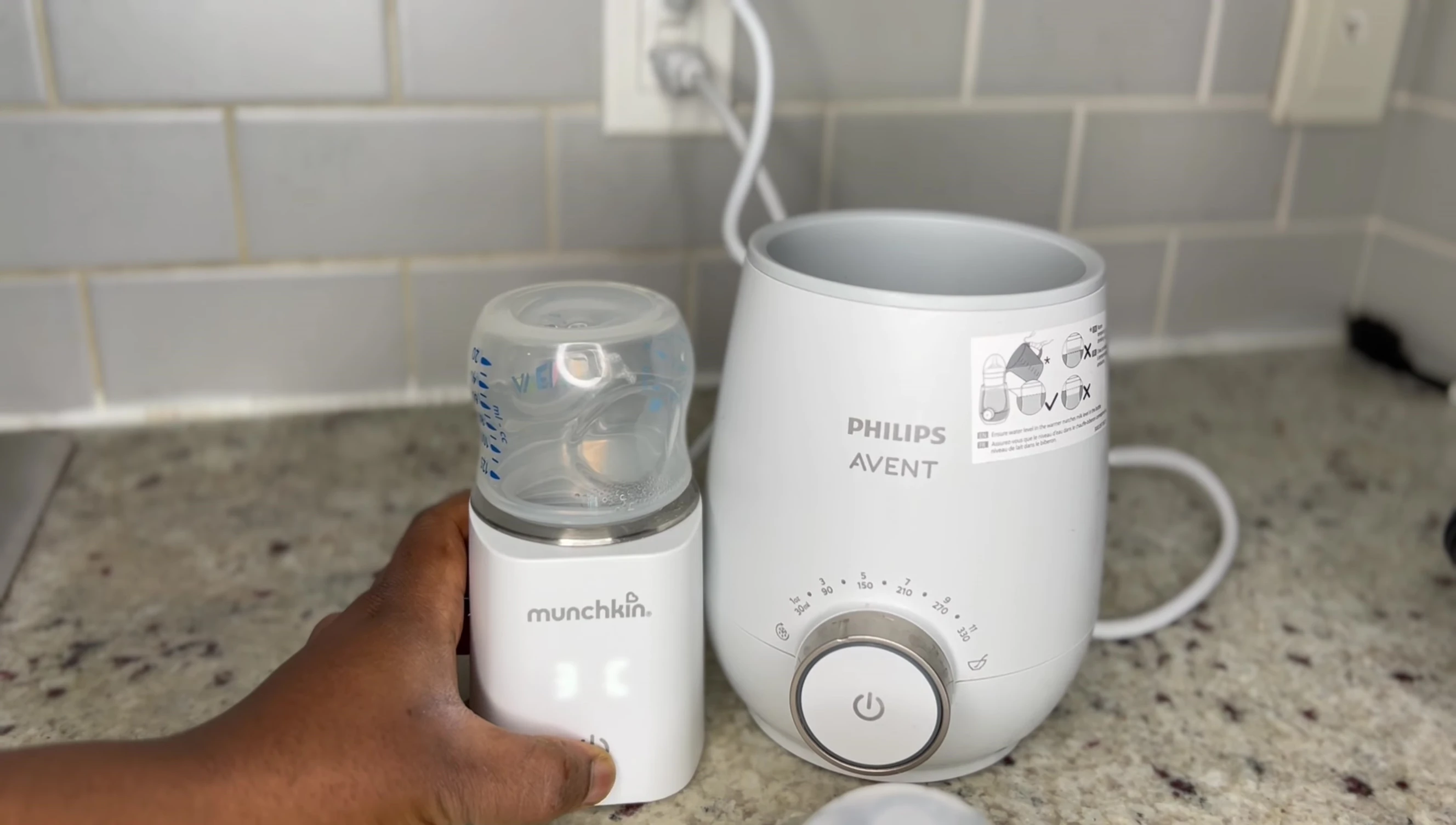Close-up of the Munchkin bottle warmer showcasing its sleek design.