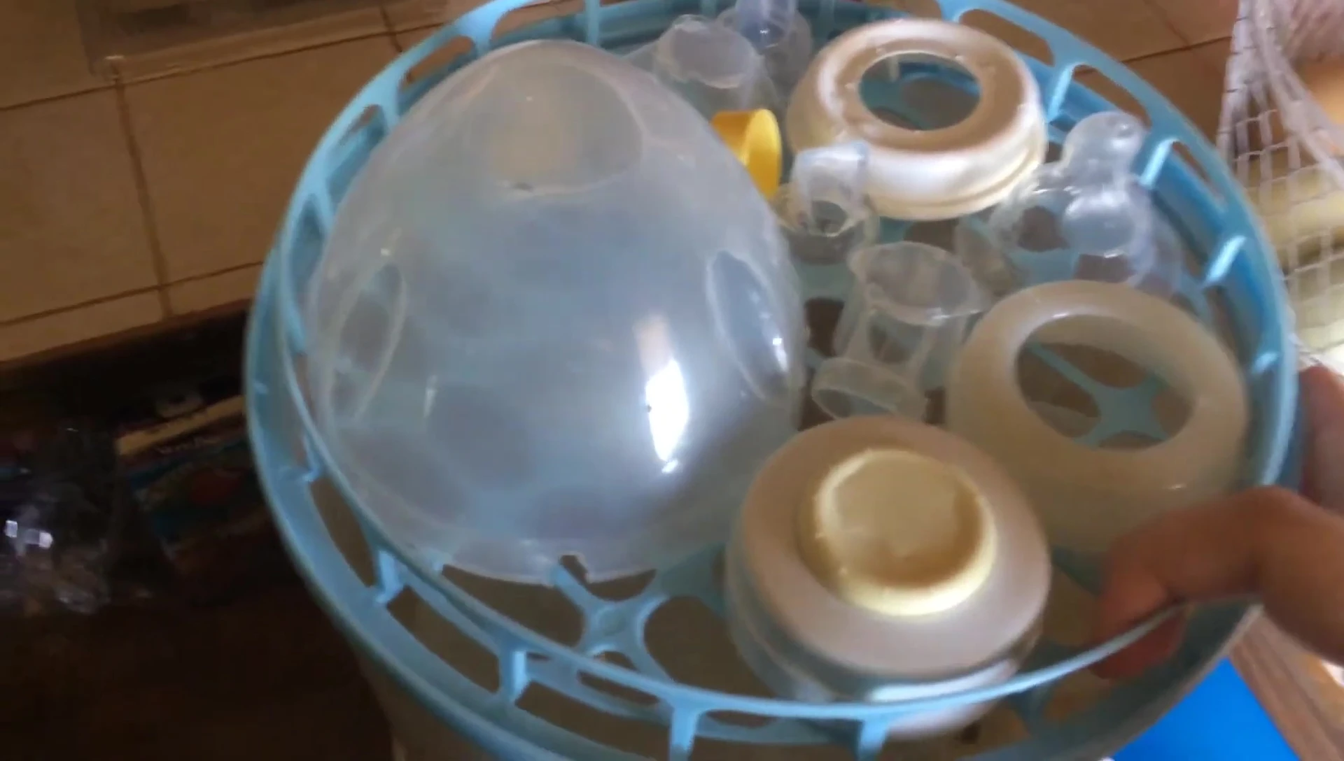 Interior of the bucket showing various items inside.