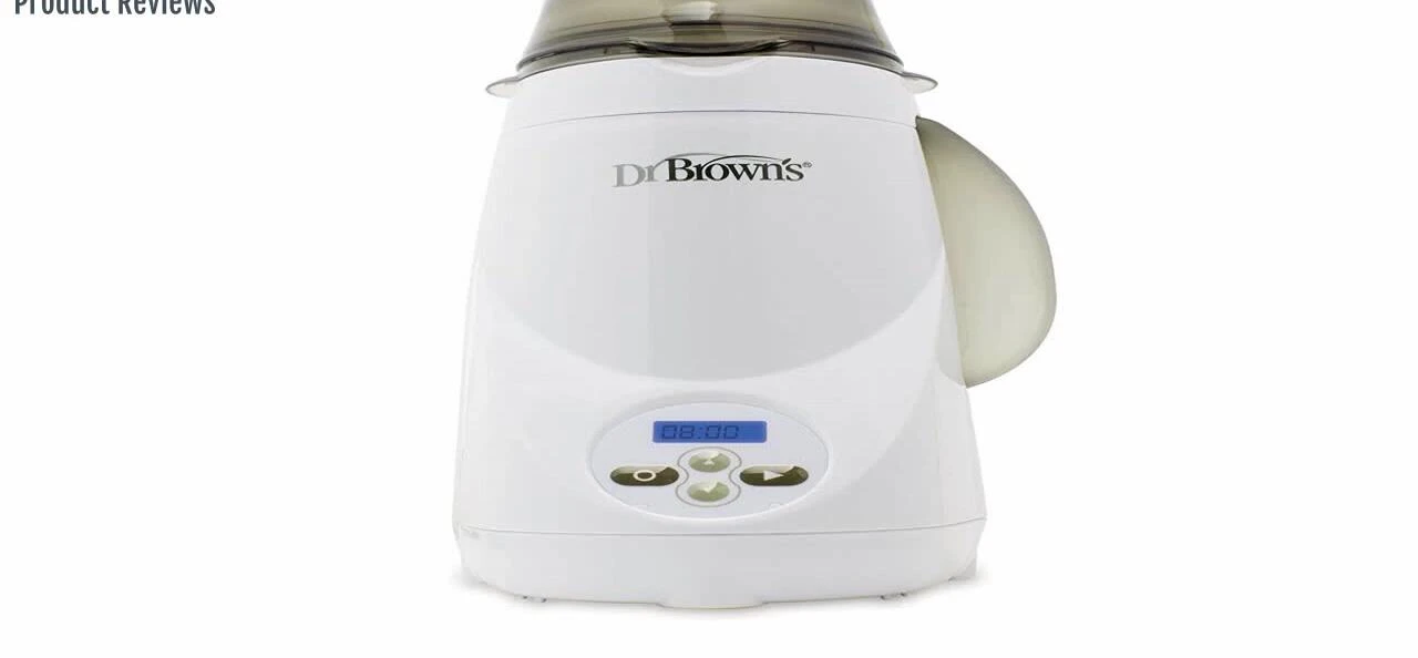 Close-up shot of the bottle warmer in action, showing the milk warming.