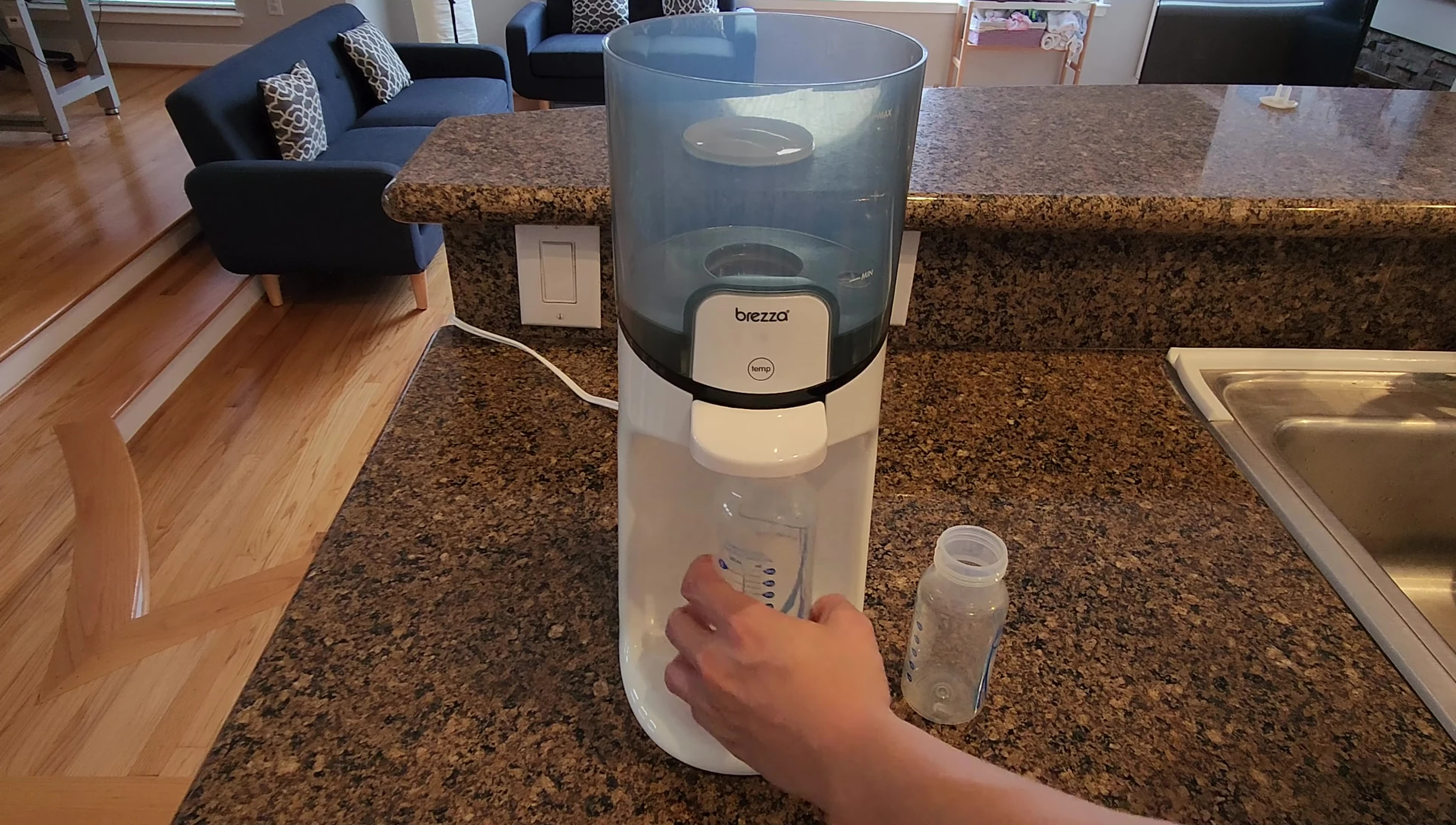8-ounce bottle requiring careful insertion into the warmer