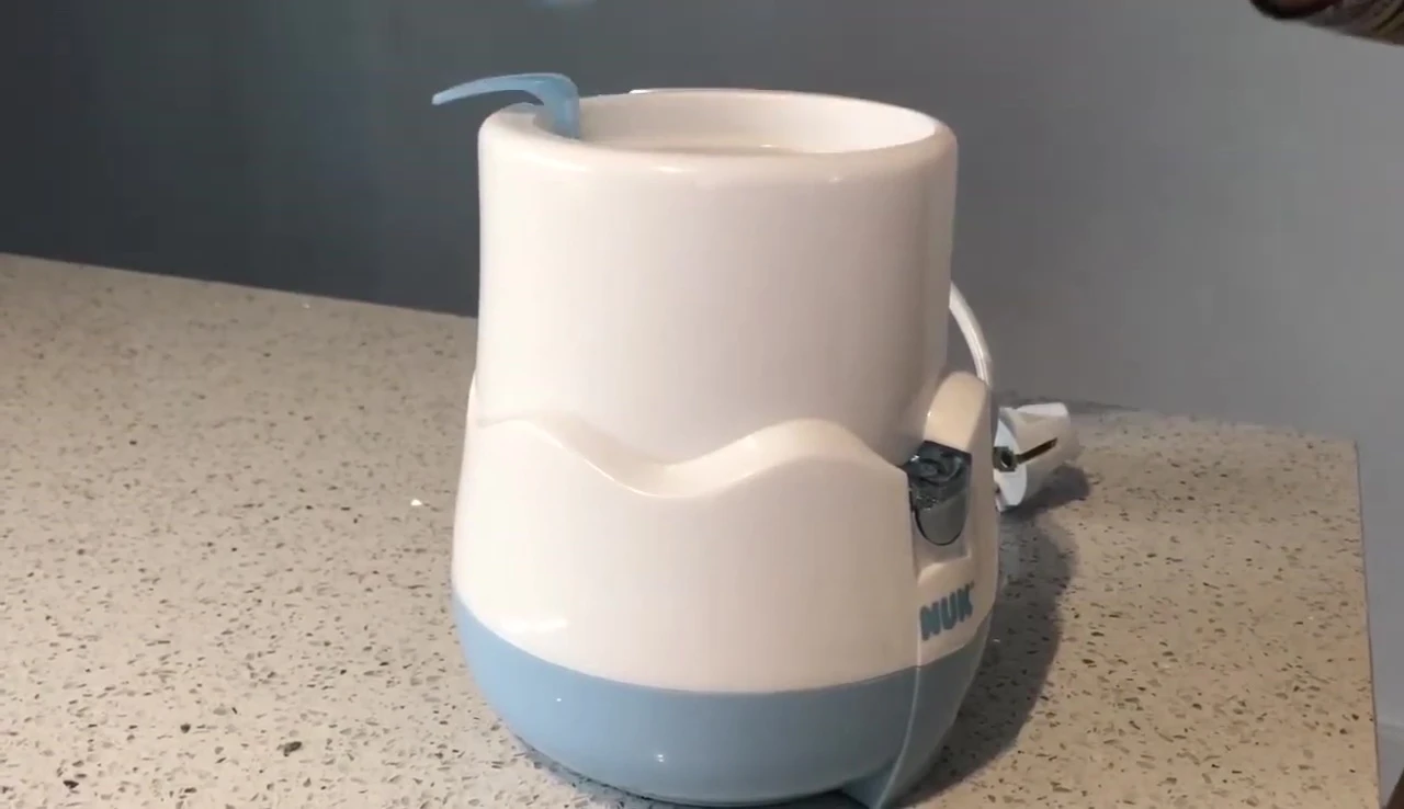 The warmer in use, showing food inside.