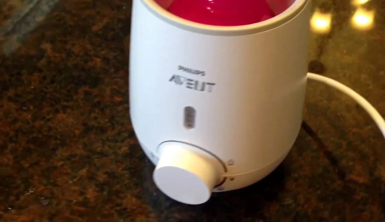The warmer being used to heat baby food.