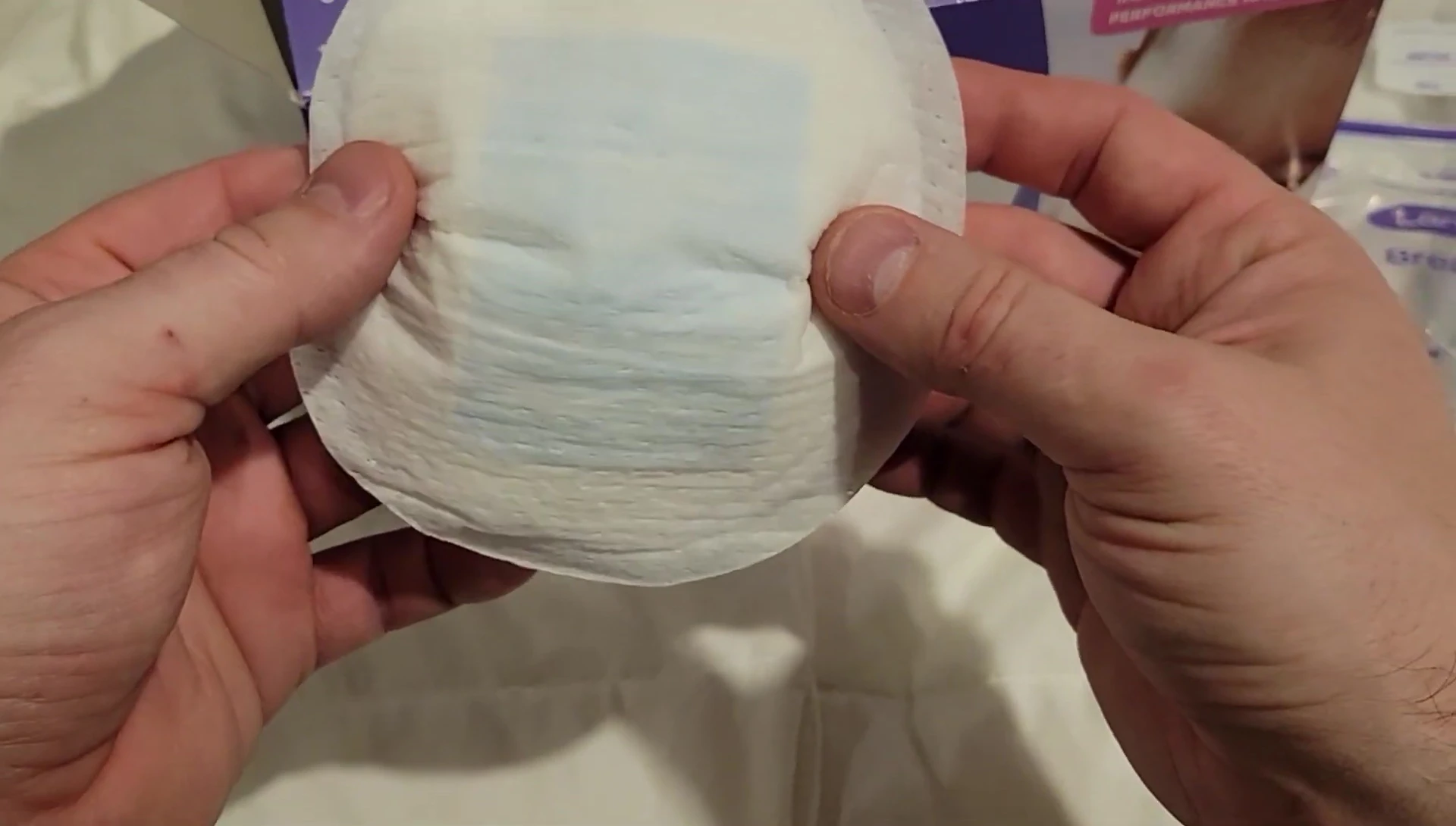 Demonstration of the absorbency of the pads.