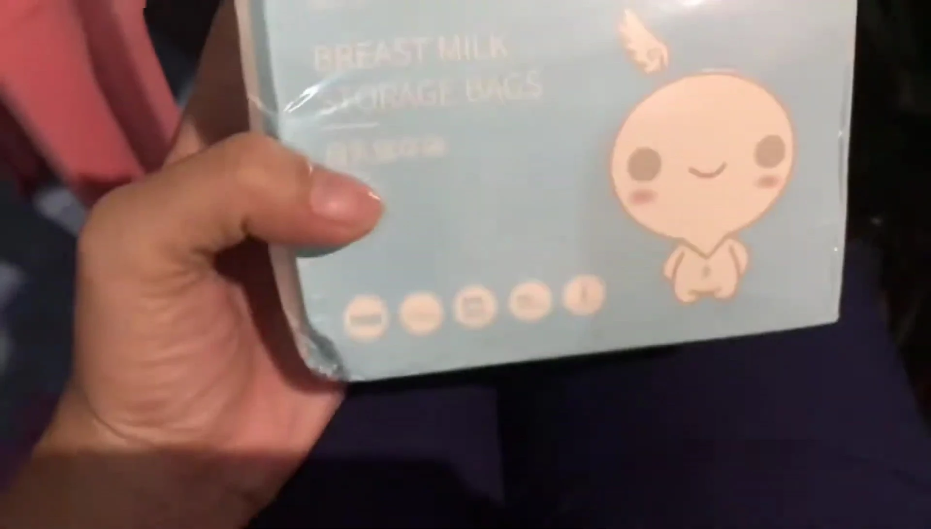 Close-up shot of the Dr. Dudu breast milk storage bag packaging.