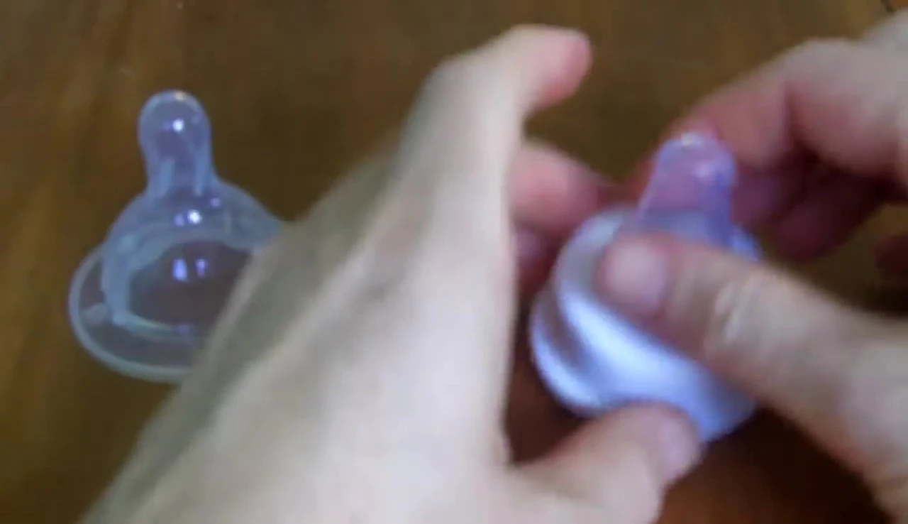 Speaker demonstrating proper latch depth using a finger.