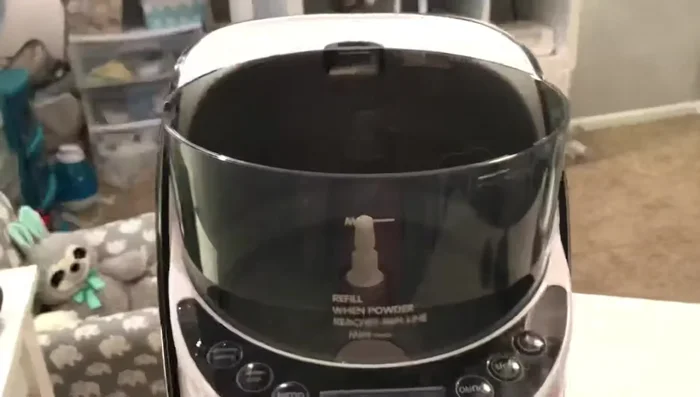 Slide the orange mixing piece into the base.