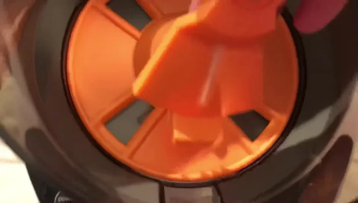 Push the mixing rake down until it clicks into place.