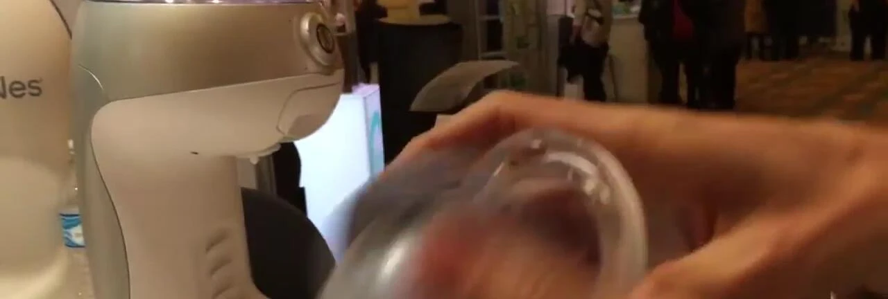 A person demonstrating the ease of use of the Gerber BabyNes.