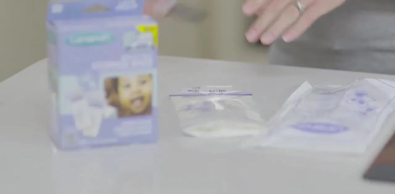Lansinoh breast milk storage bags lying flat in a freezer.