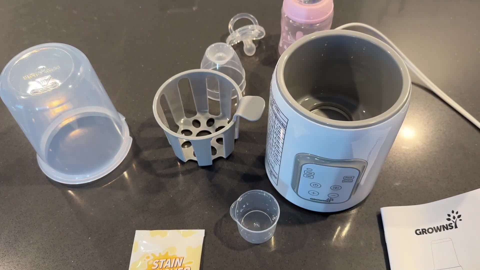 The GROWNSY 8-in-1 Baby Bottle Warmer and its accessories