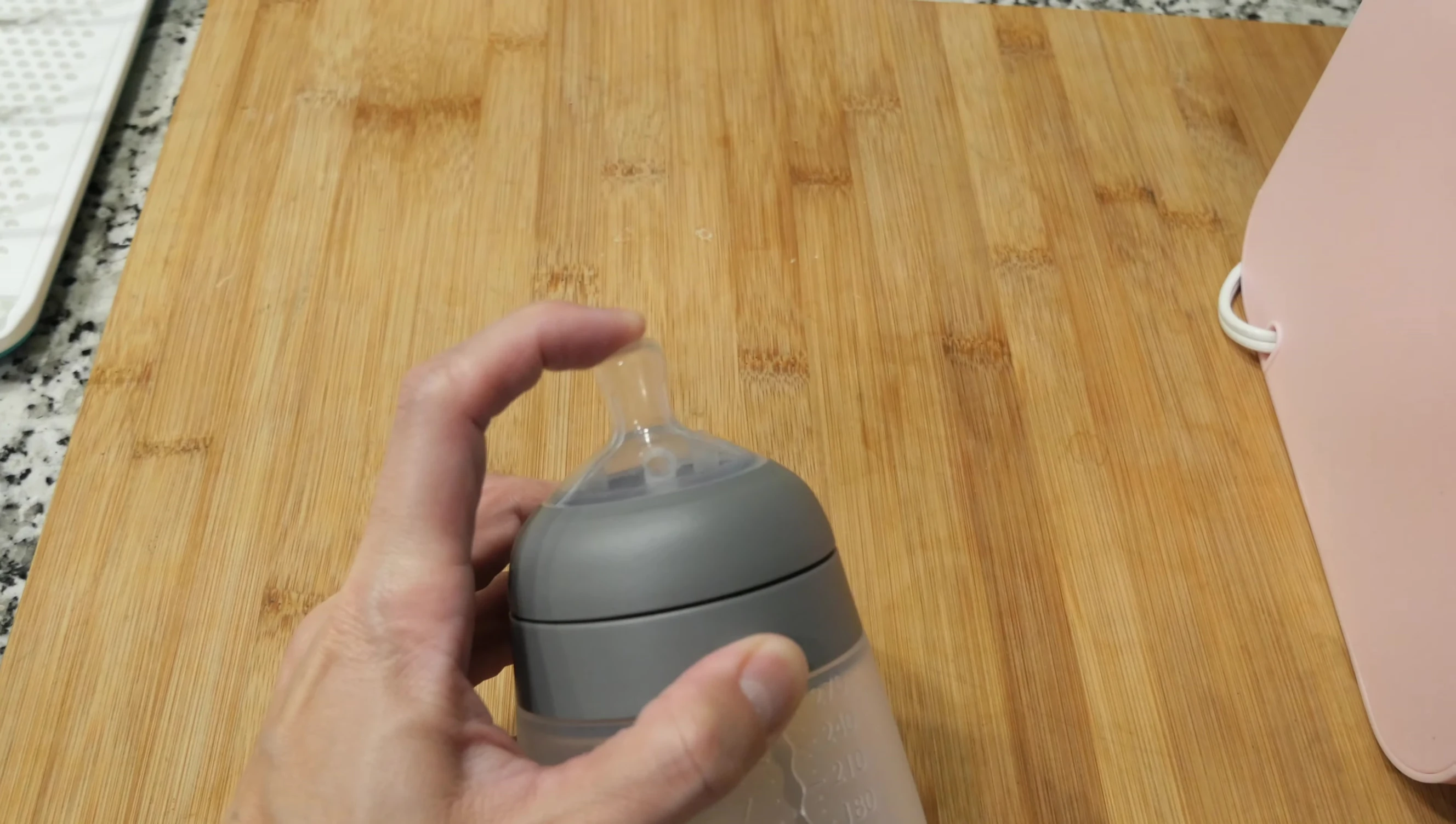 The Nanobebe bottle nipple displayed, emphasizing its softness.