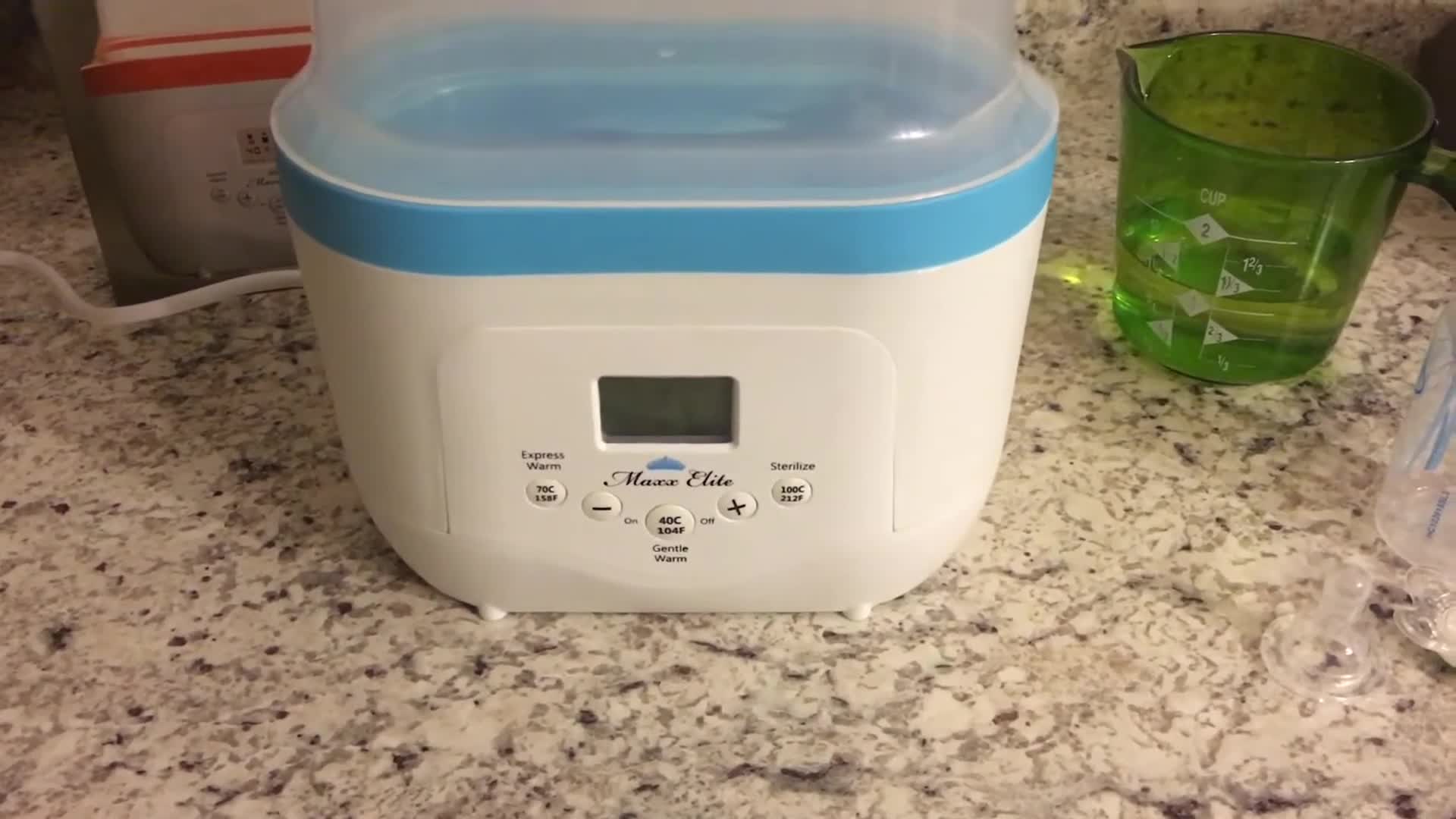Close-up of the unit showing the double bottle capacity.