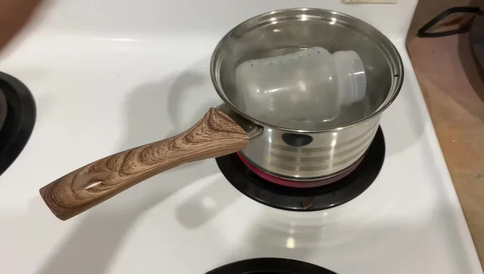 Sterilize for five minutes, moving the parts around with tongs to ensure even sterilization.