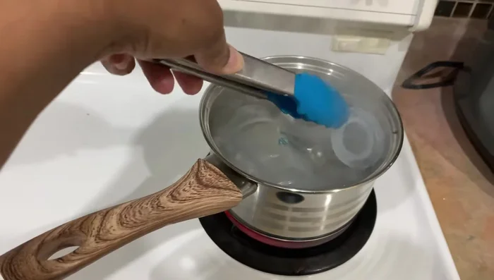 Sterilize for five minutes, moving the parts around with tongs to ensure even sterilization.