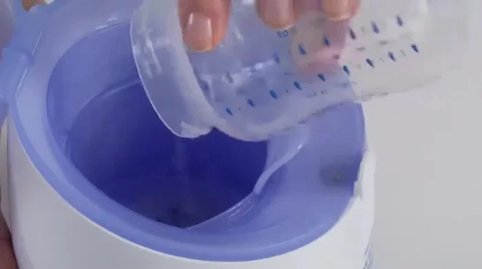 Close the lid securely until it clicks.