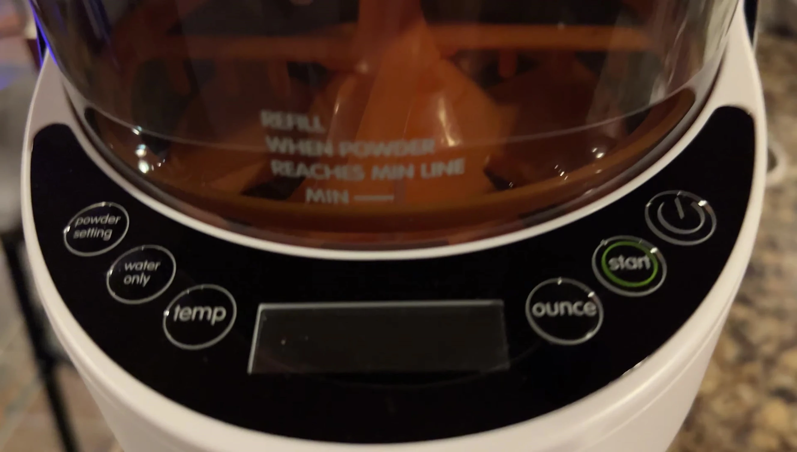 Disassembling the Baby Brezza for cleaning.