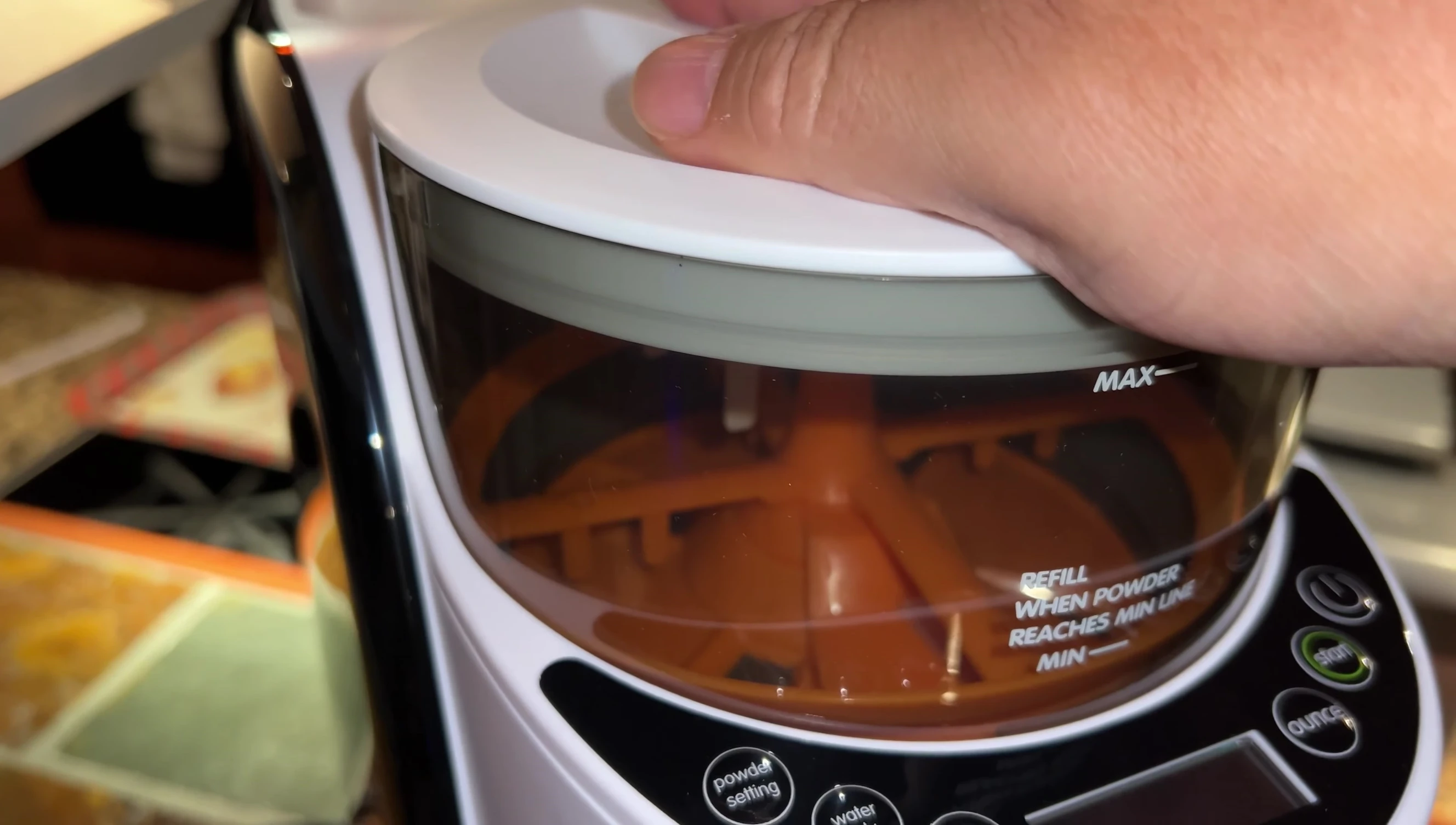 Close-up of the pre-assembled powder container.