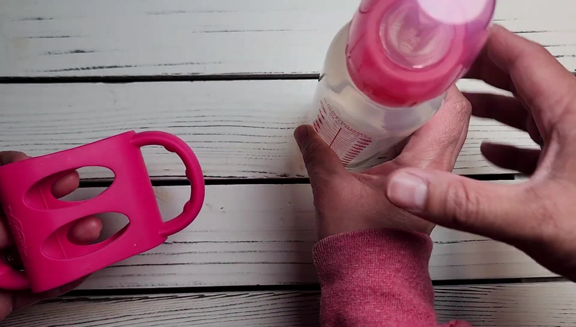 Close-up showcasing the silicone handles integrated into the bottle