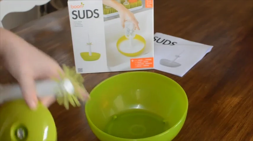 Close-up of the disassembled Boon SUDS bottle washer components.