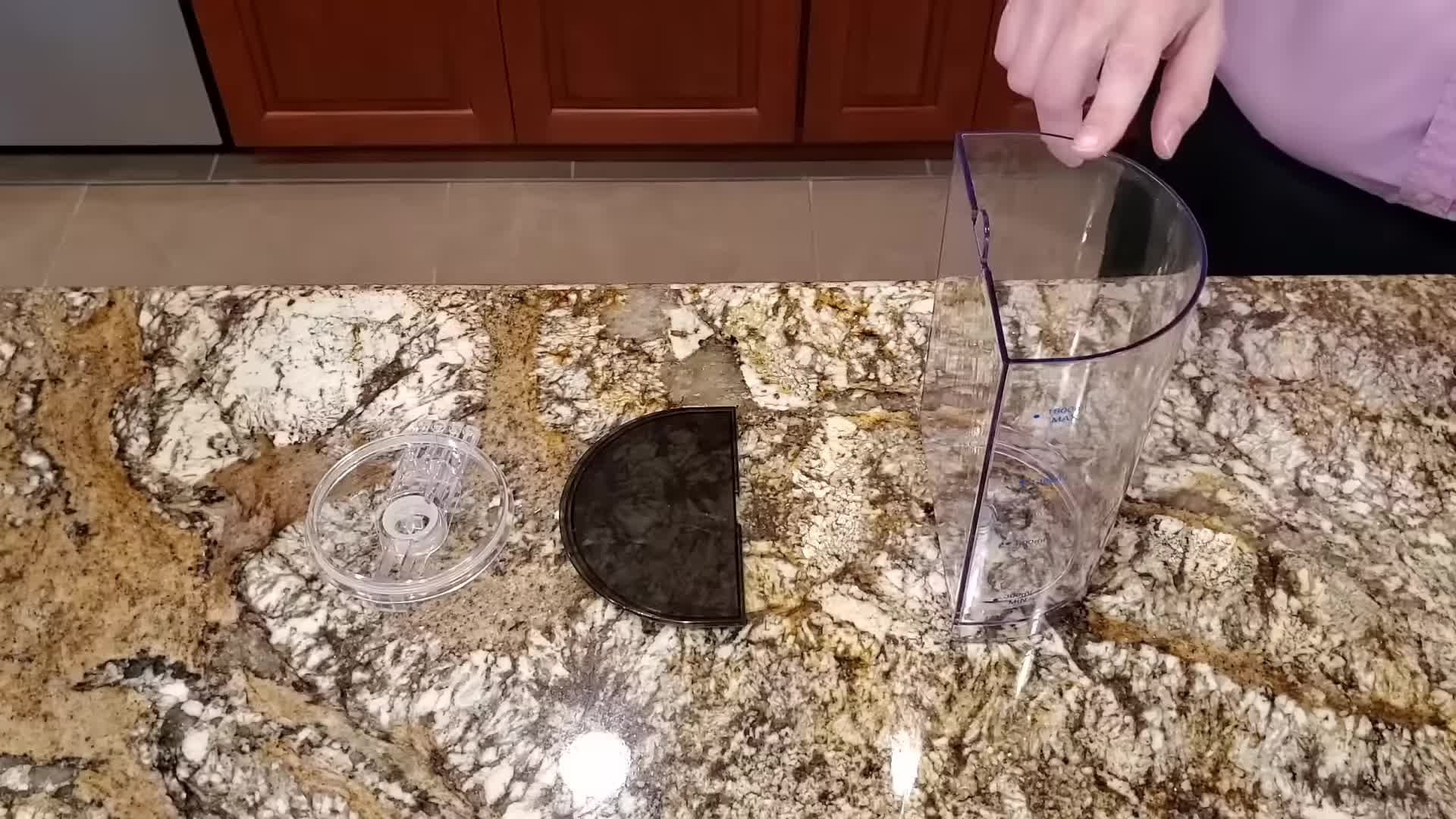 The removable water tank and cover.