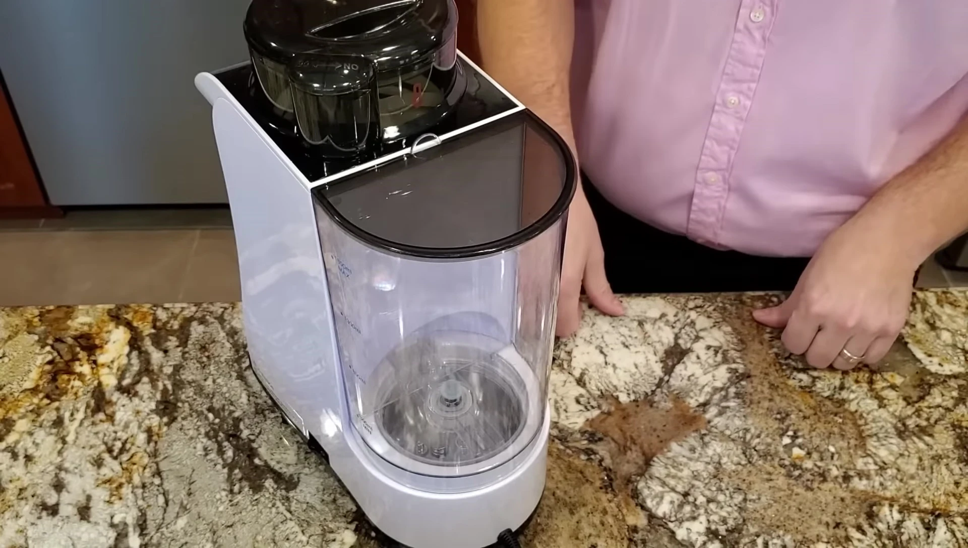 The milk powder box, feeding carousel, and stator.