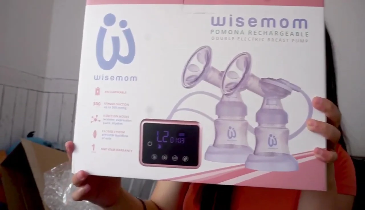 Close-up of the Wisemom breast pump inside the box.