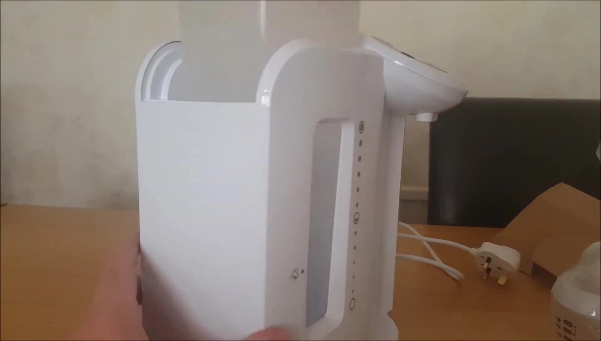 A close-up view of where to insert the water and filter.