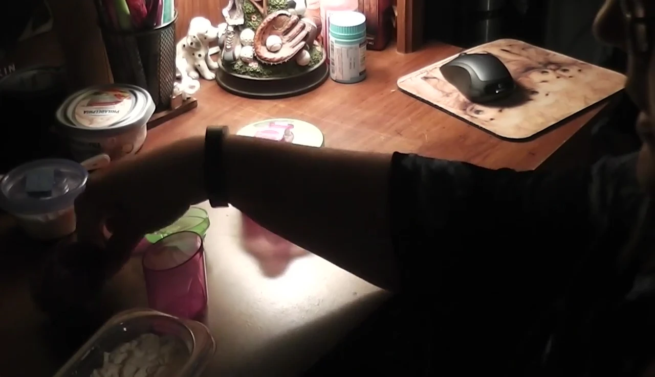 A scoop of protein powder being measured