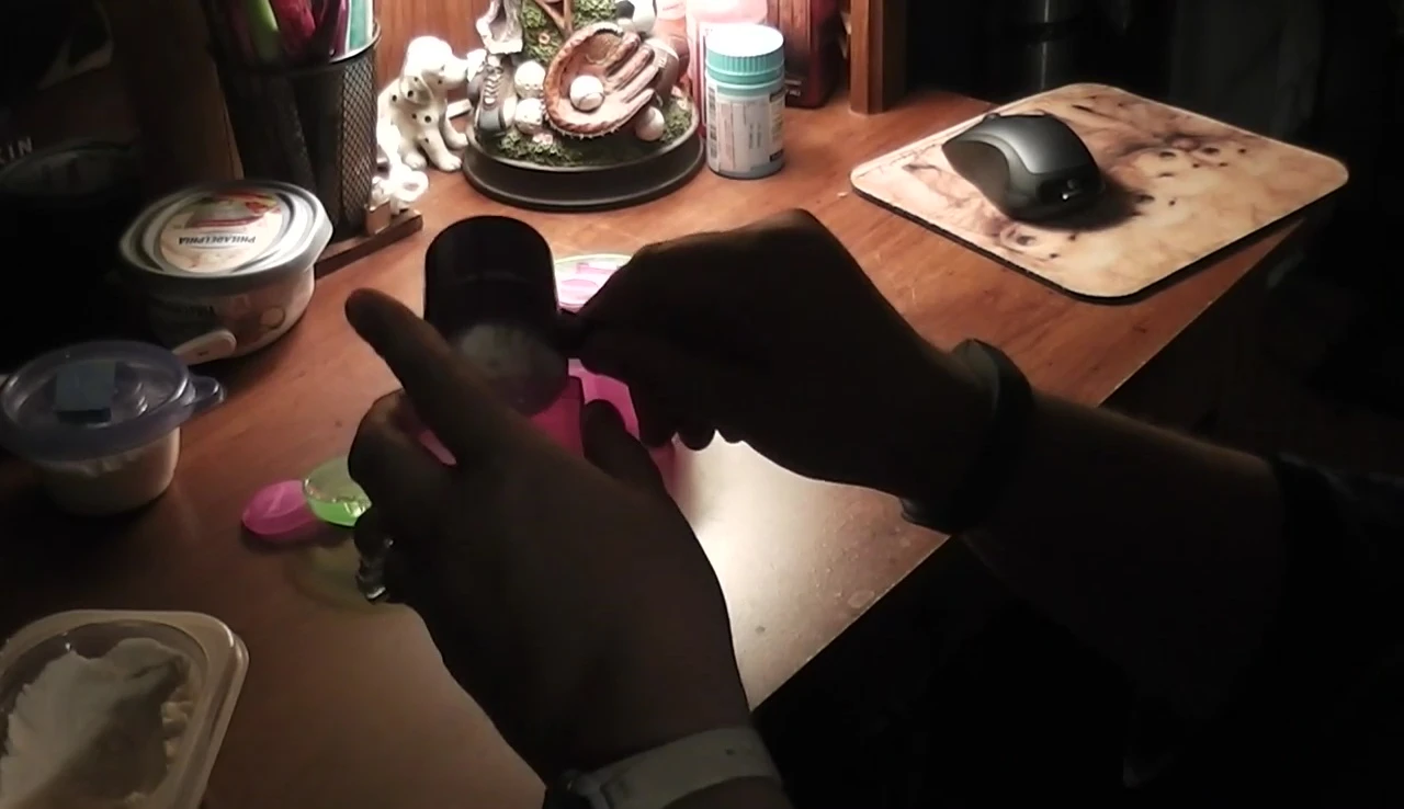 Pouring powder into the dispenser
