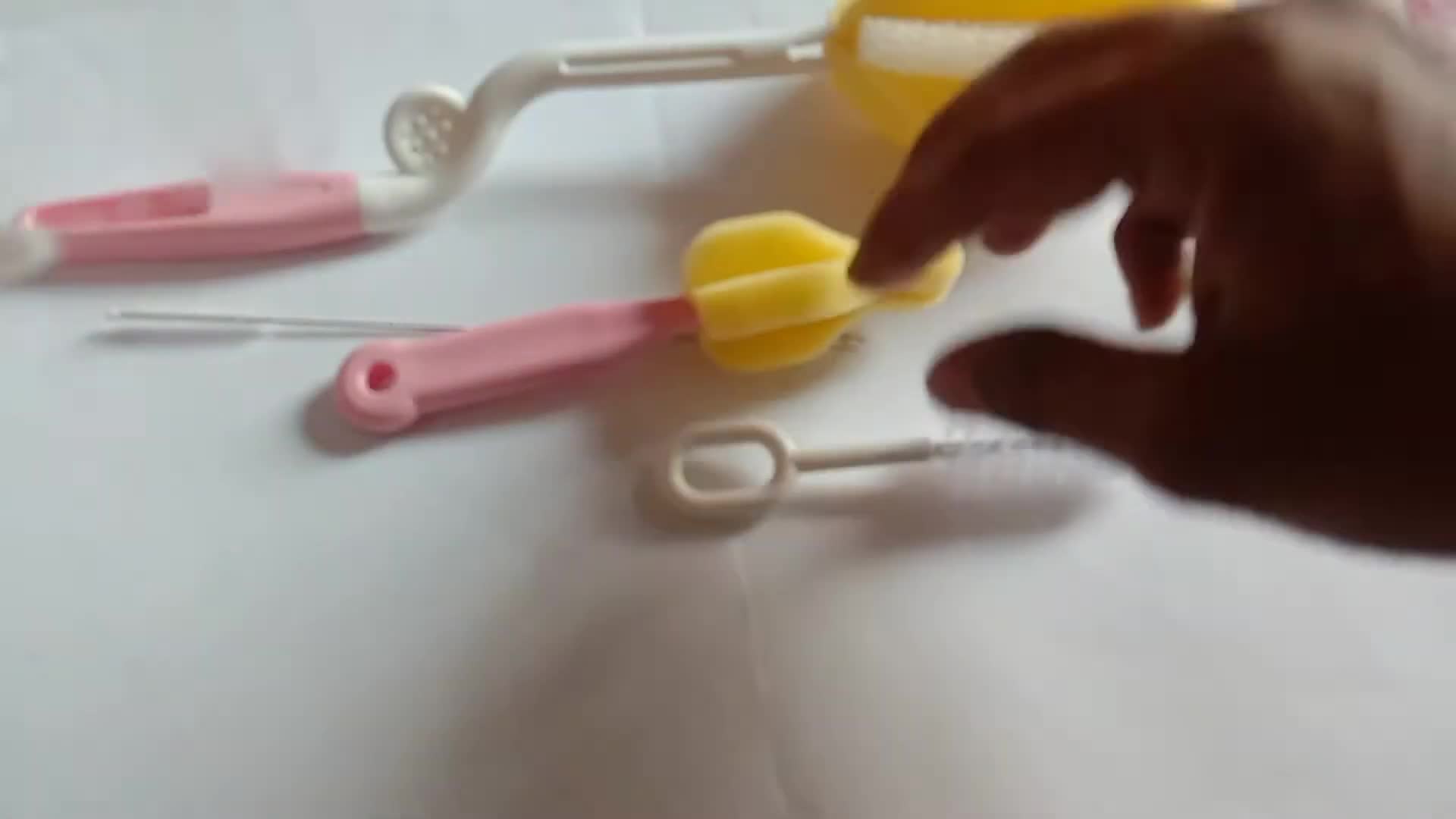 Close-up view of the smaller brushes included in the set.