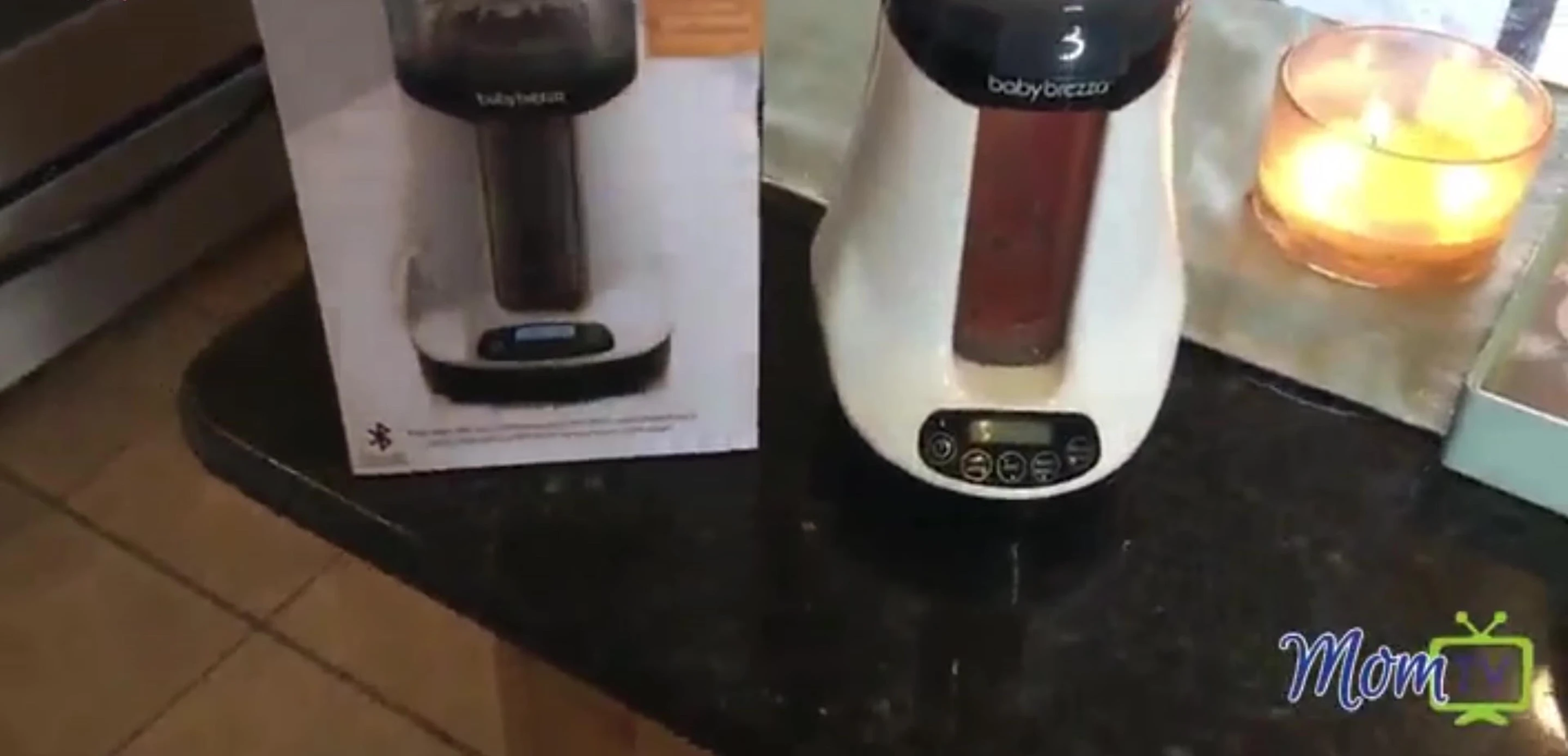 Baby Brezza app interface shown on phone